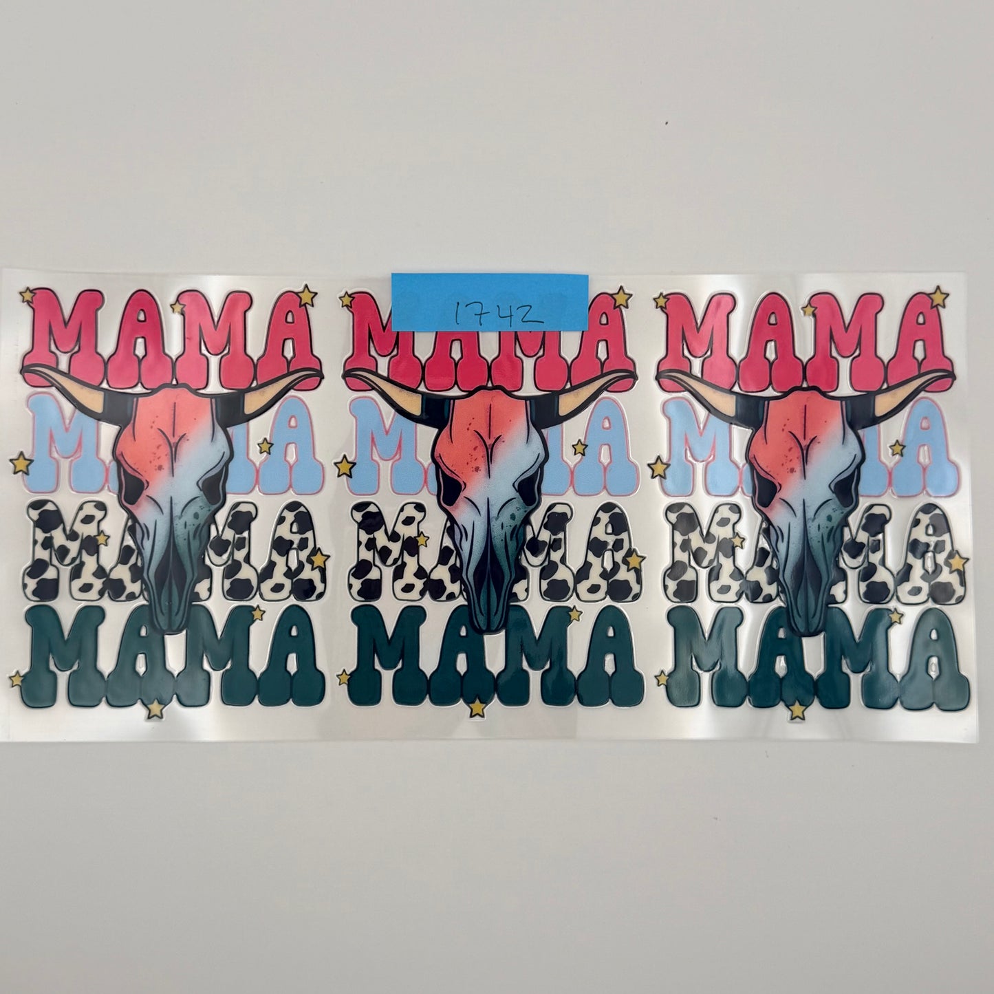 mama 3 times with cow skull