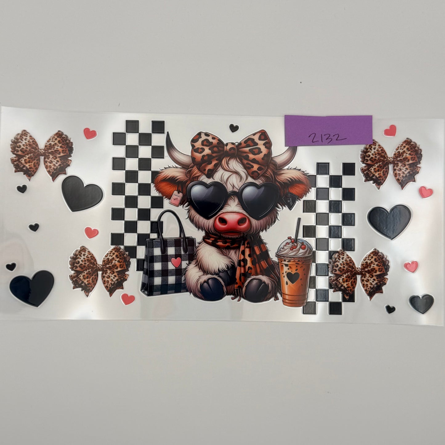 highland cow with heart glasses and purse