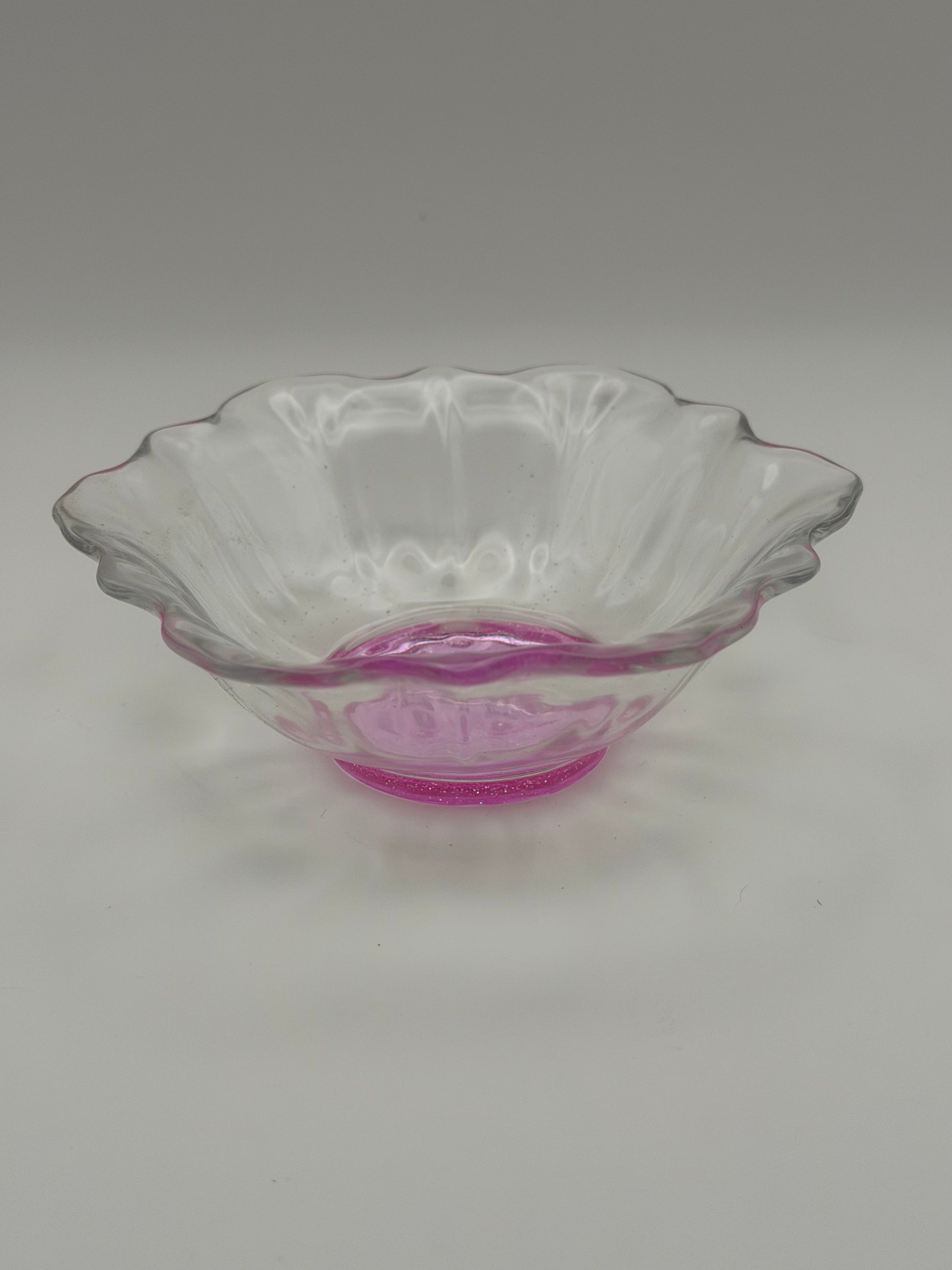 Small clear with purple hue flower-shaped bowl