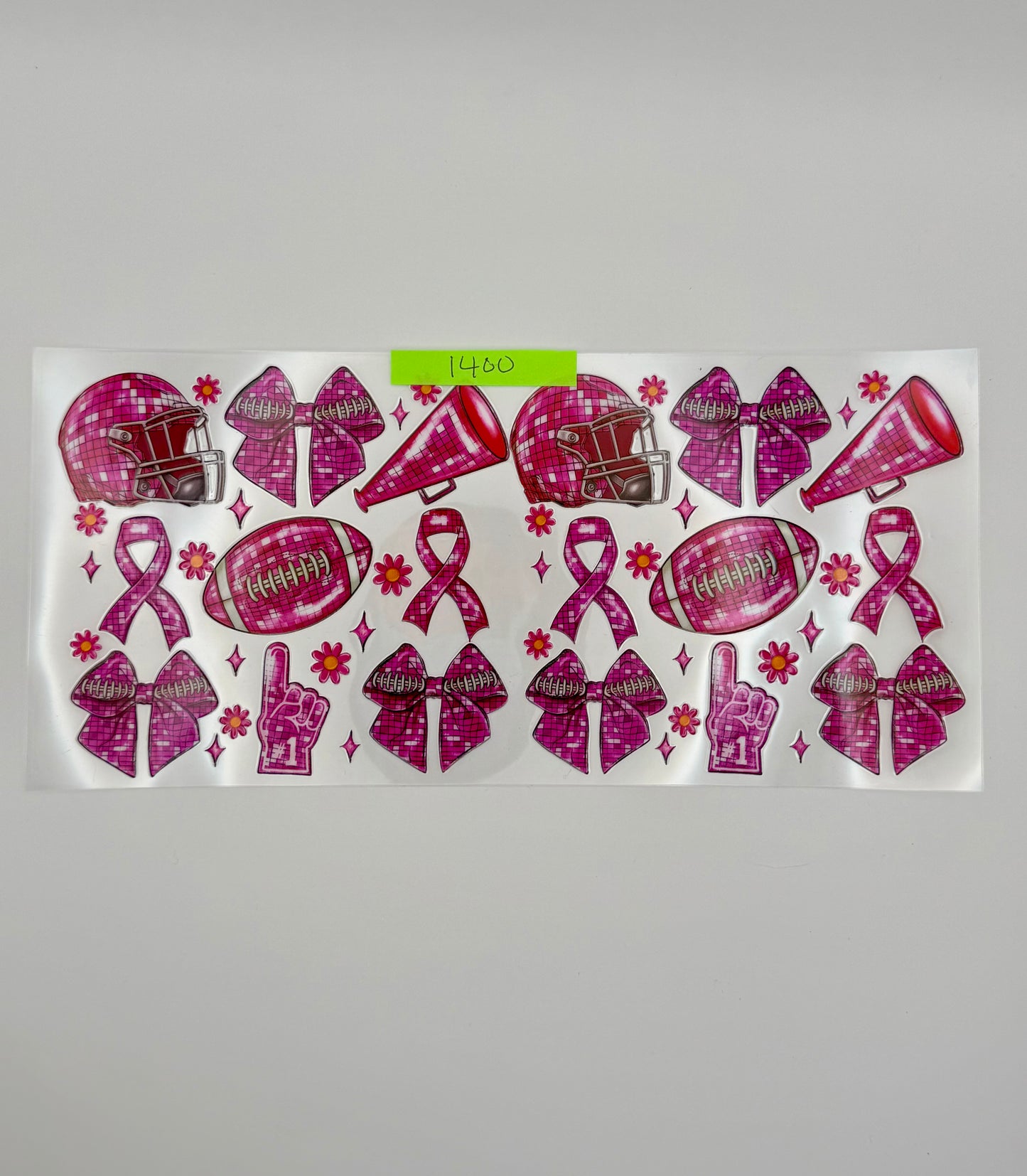 pink football, bows, helmets