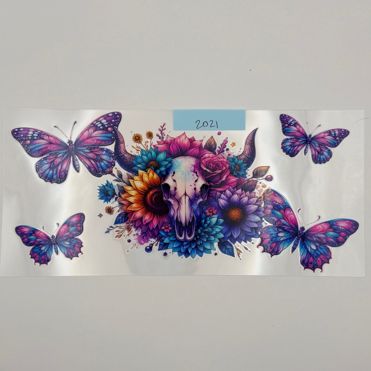 purple cow skull with butterflies