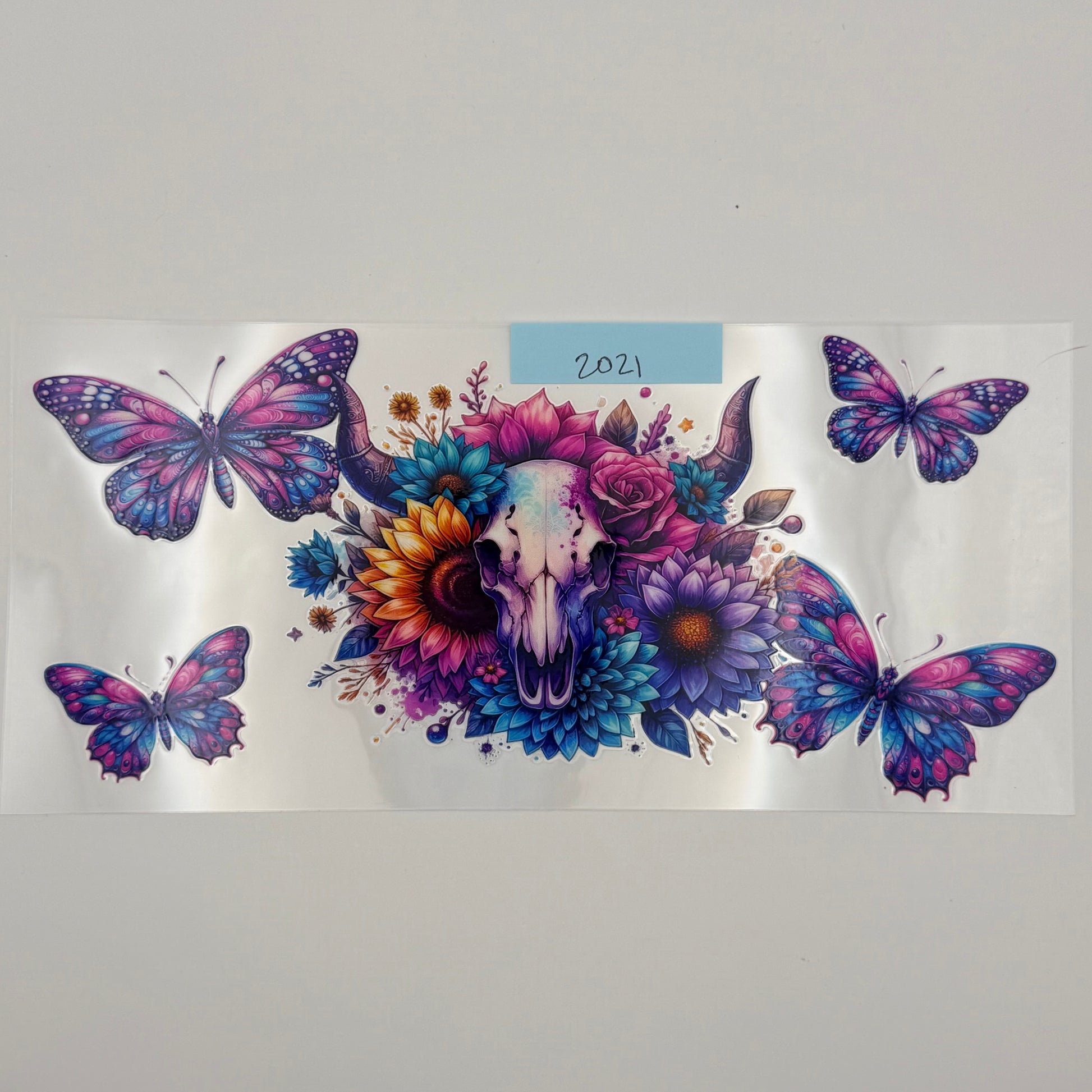 purple cow skull with butterflies