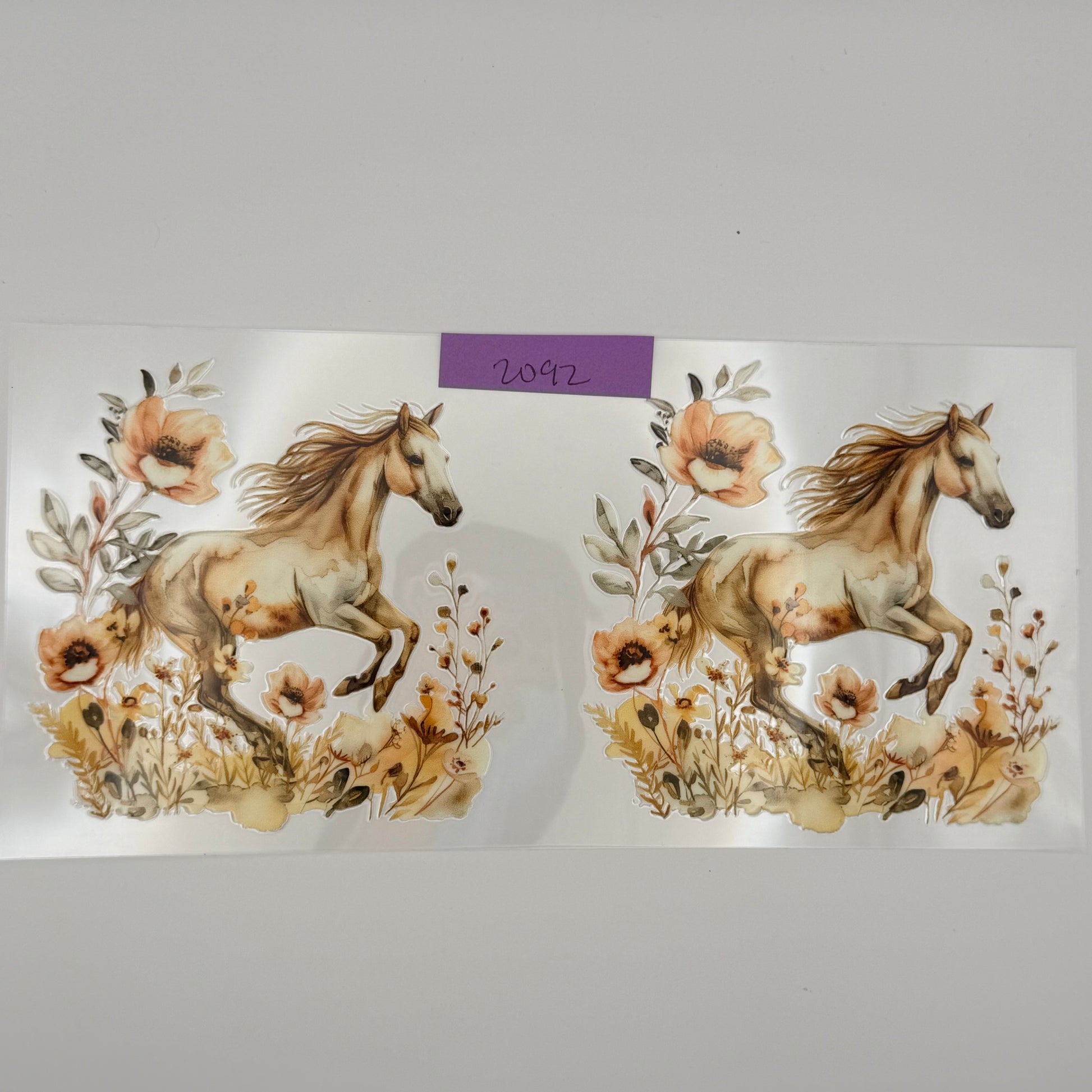 beige horse with flowers