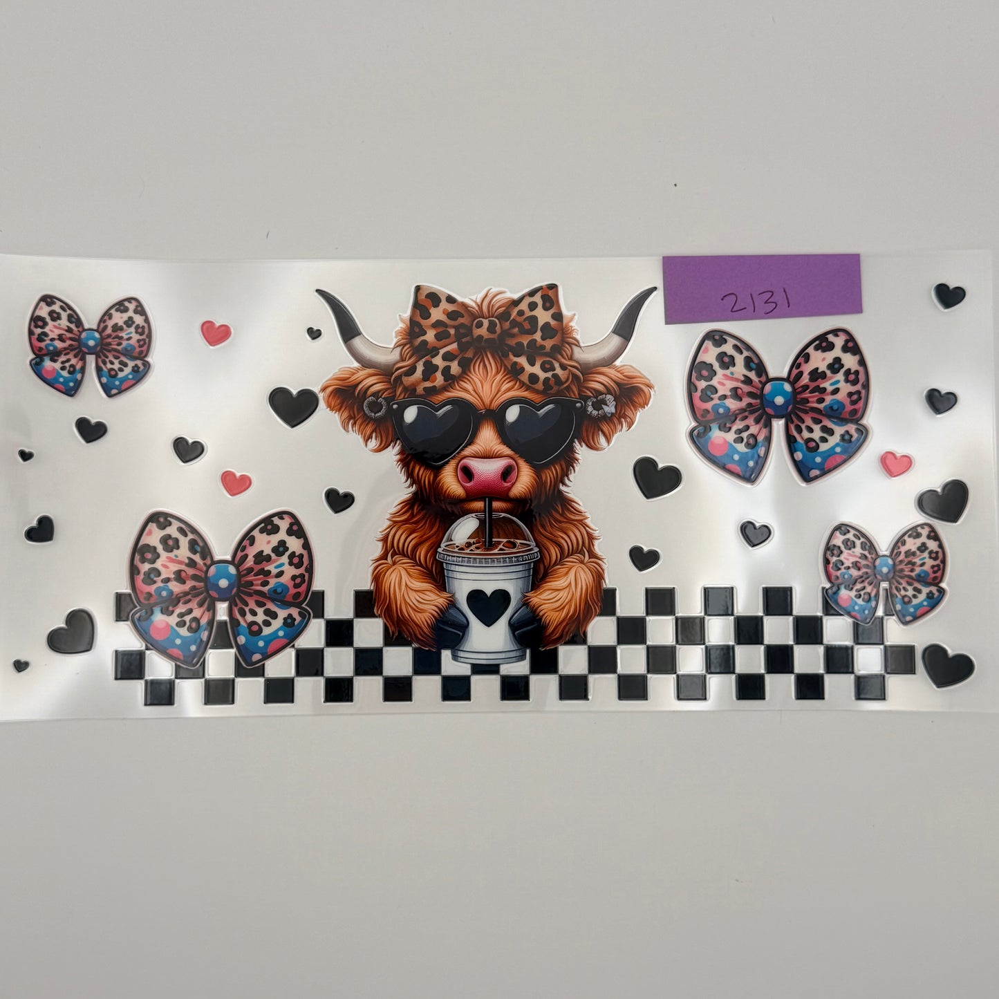 highland cow with heart glasses