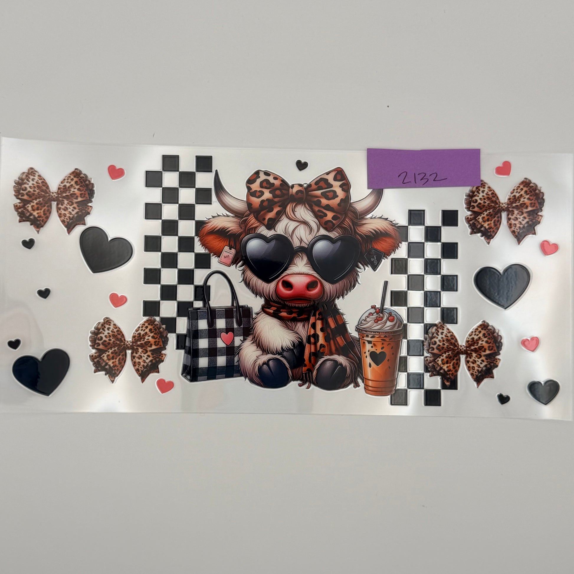 highland cow with heart glasses and purse