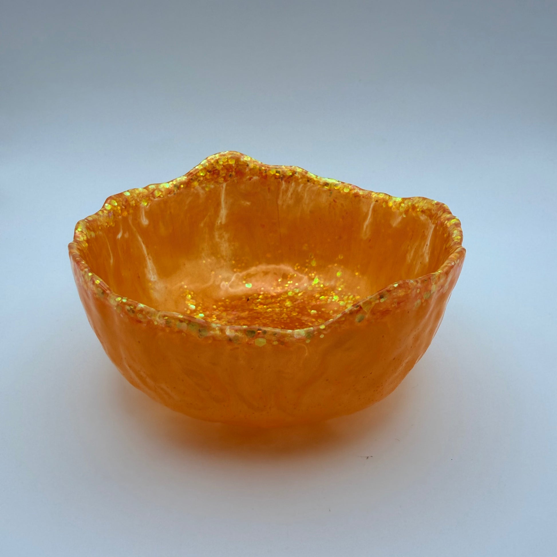 orange and glitter irregular shaped bowl