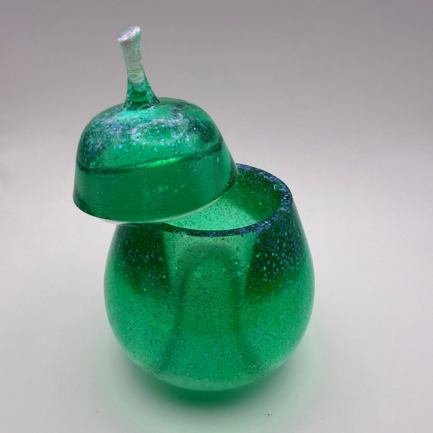green transparent pear container