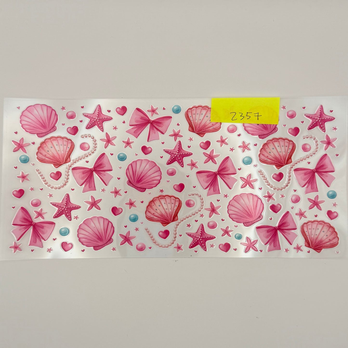 pink shells, bows, starfish