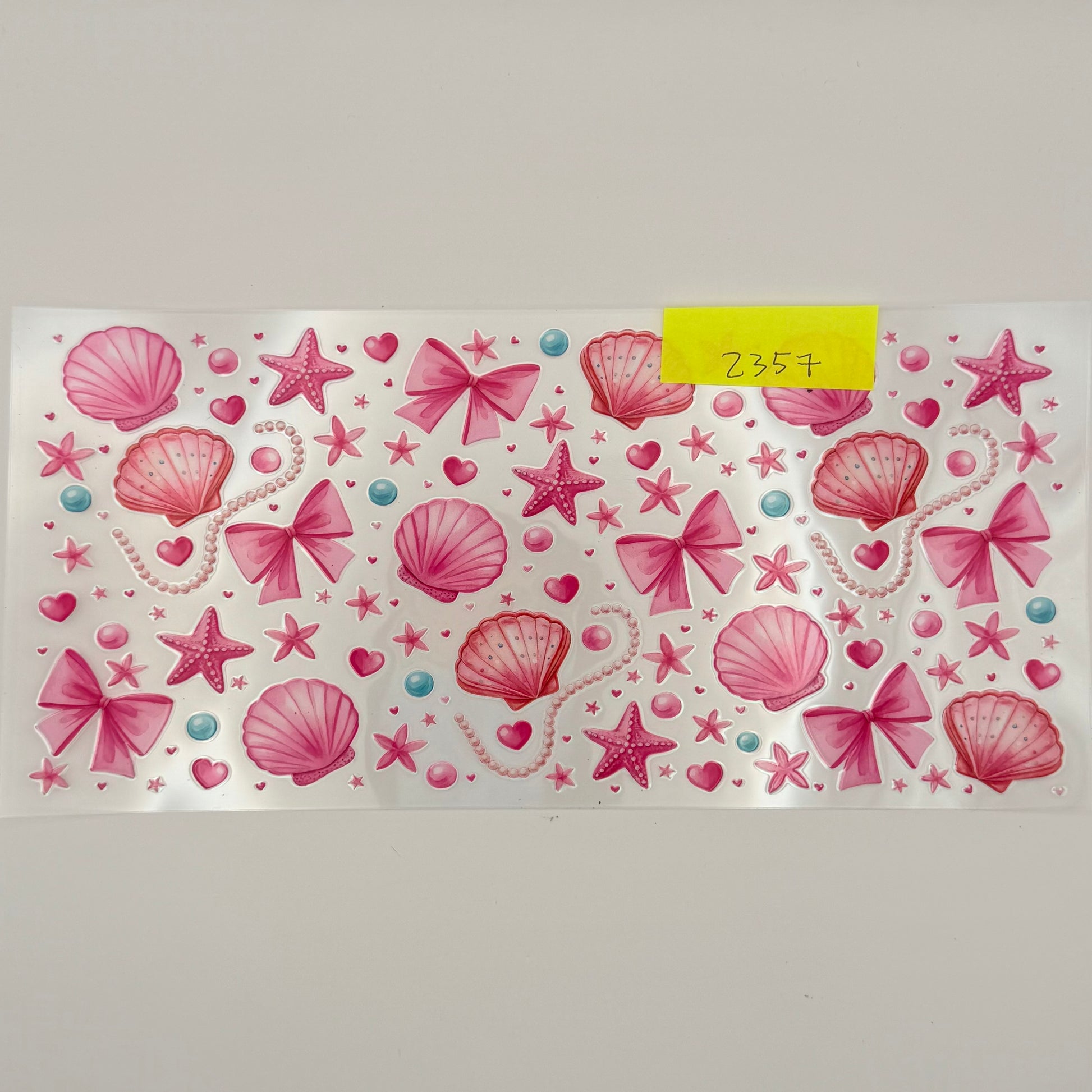 pink shells, bows, starfish
