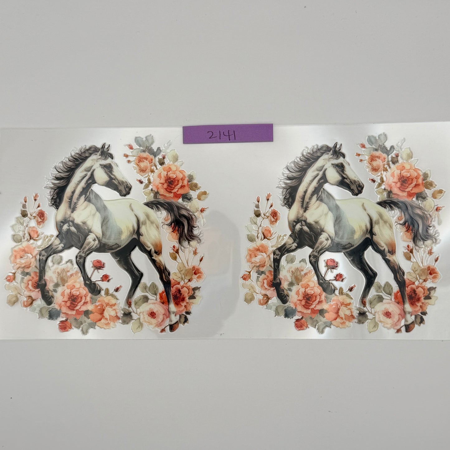 beige horse with flowers