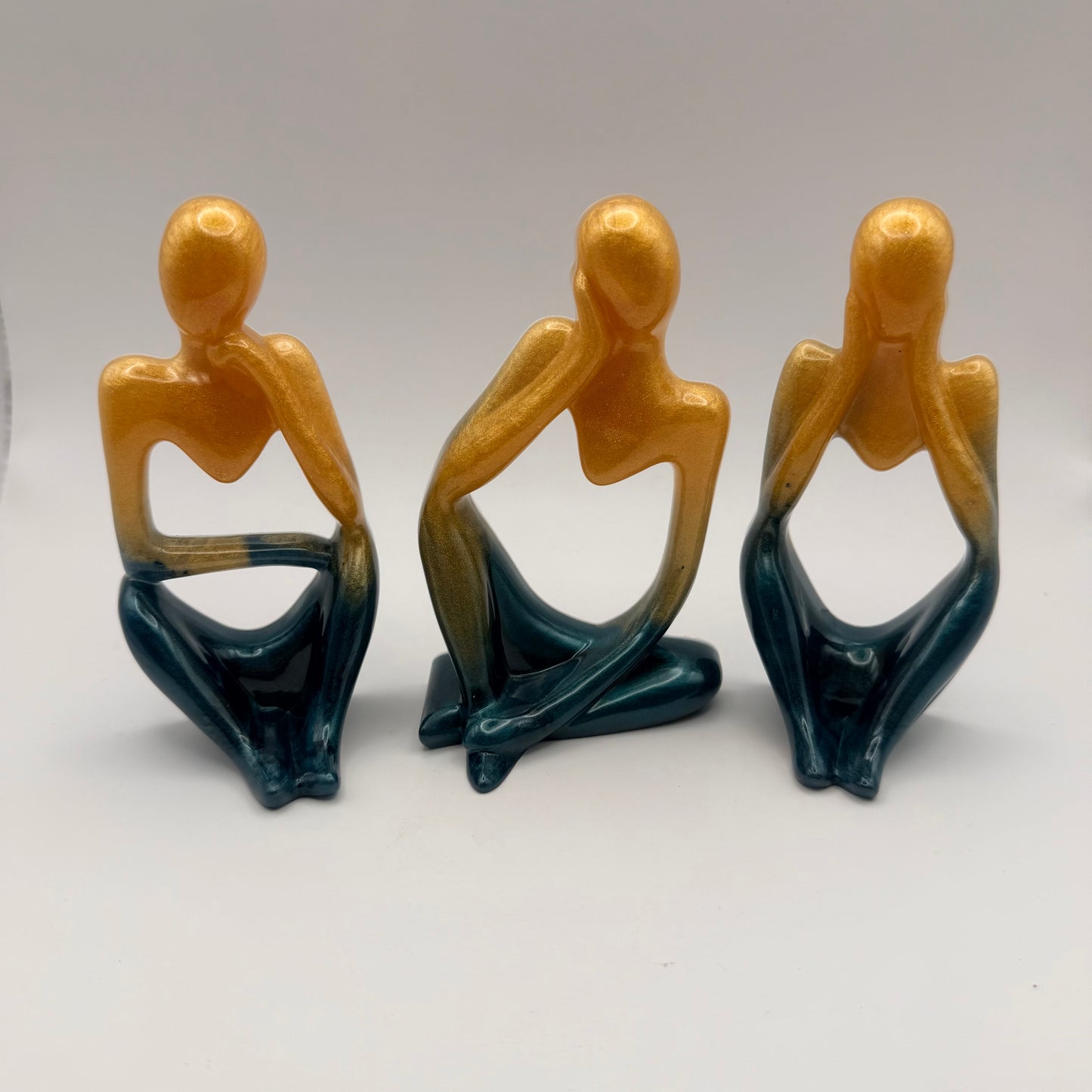 Gold and Blue/Green Set of “Thinkers”