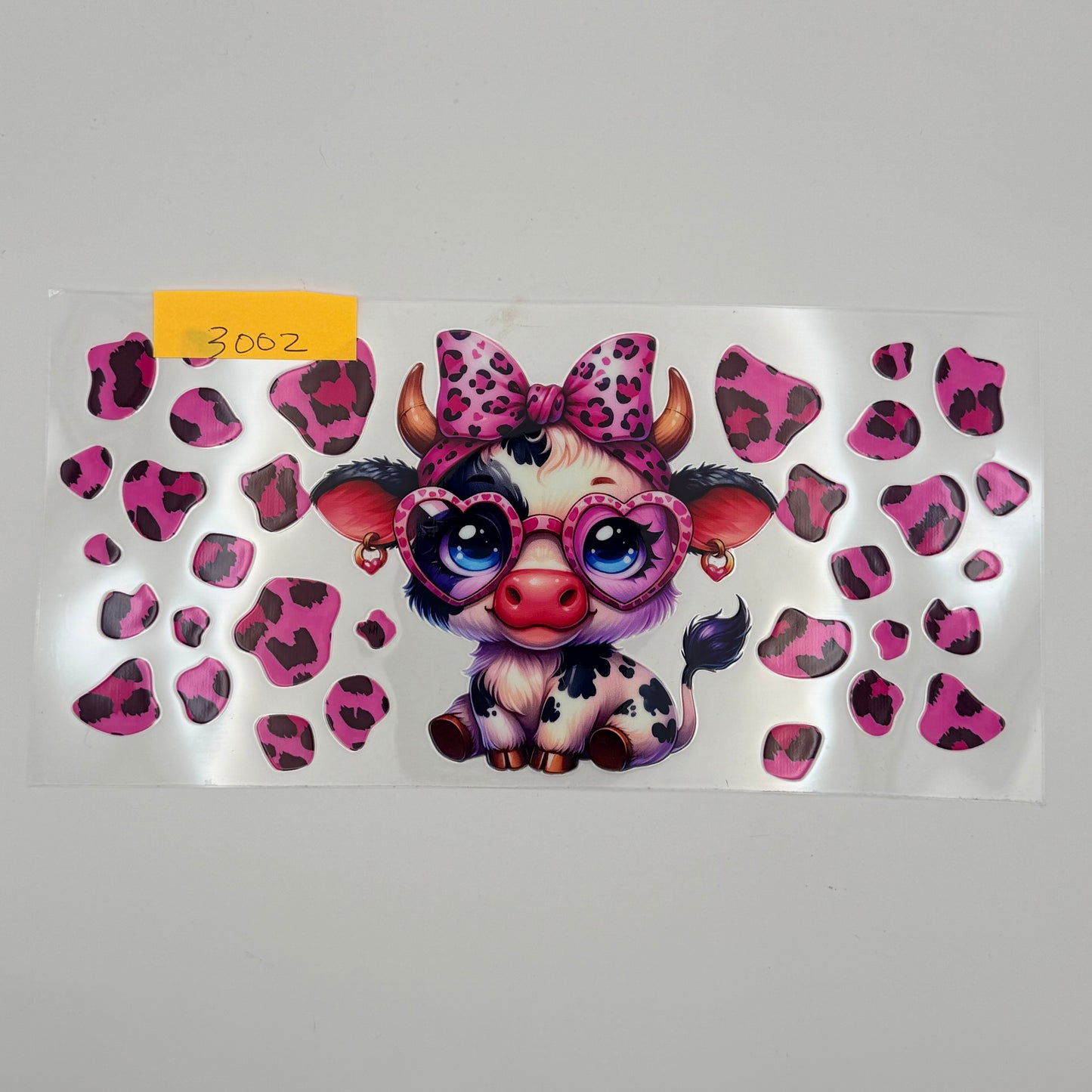highland cow with pink leopard print