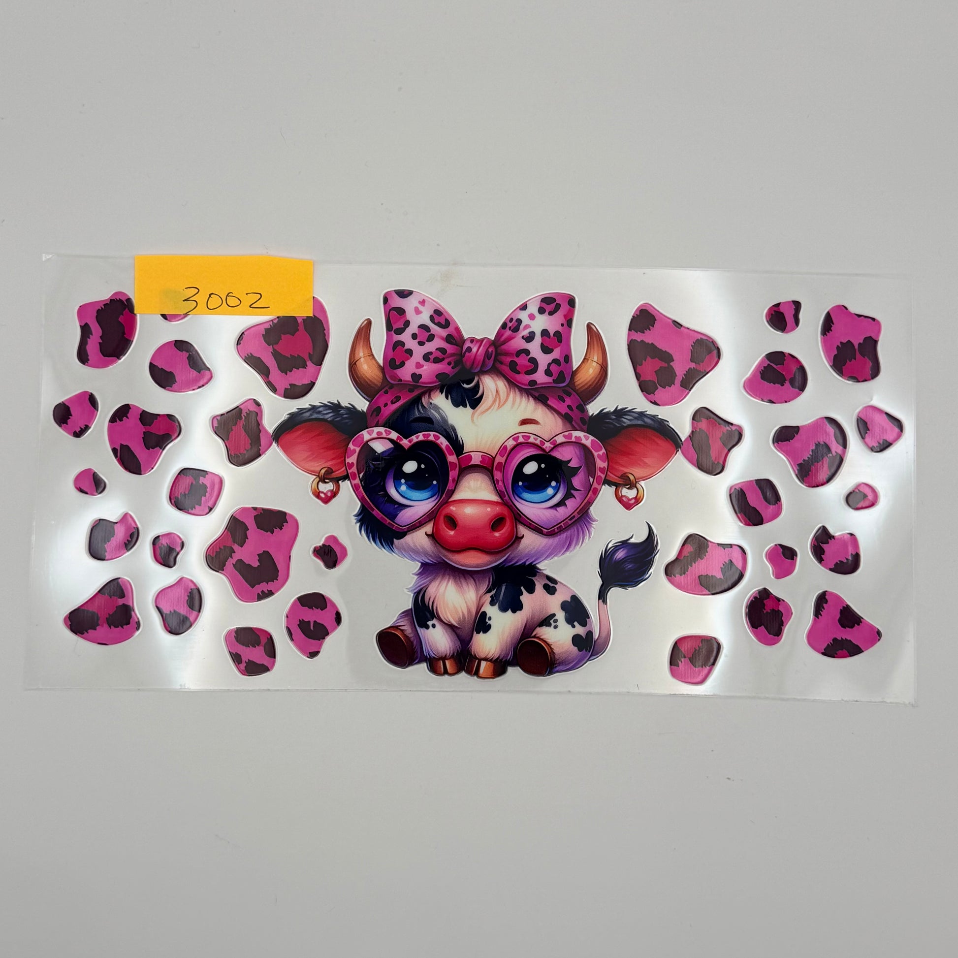 highland cow with pink leopard print