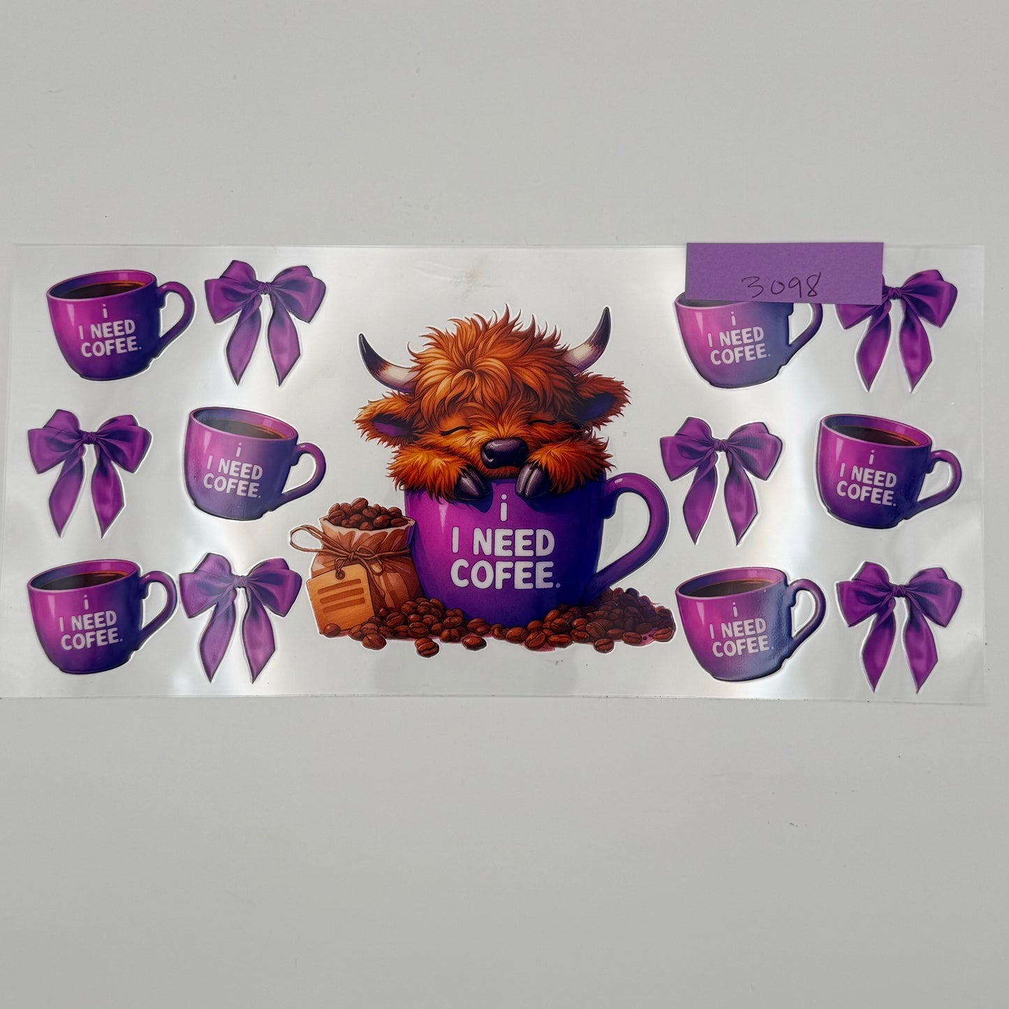 Sleeping highland cow needs coffee