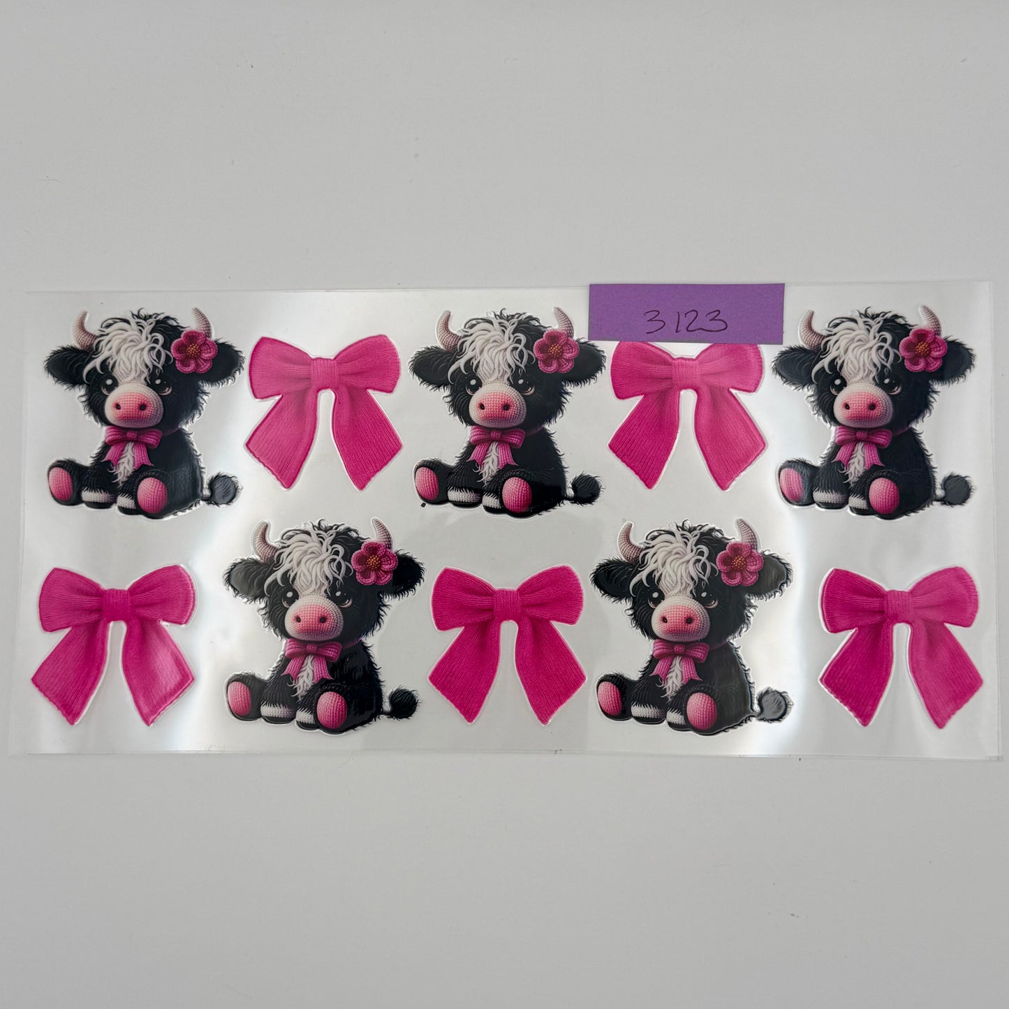 Crochet highland cows with pink bows
