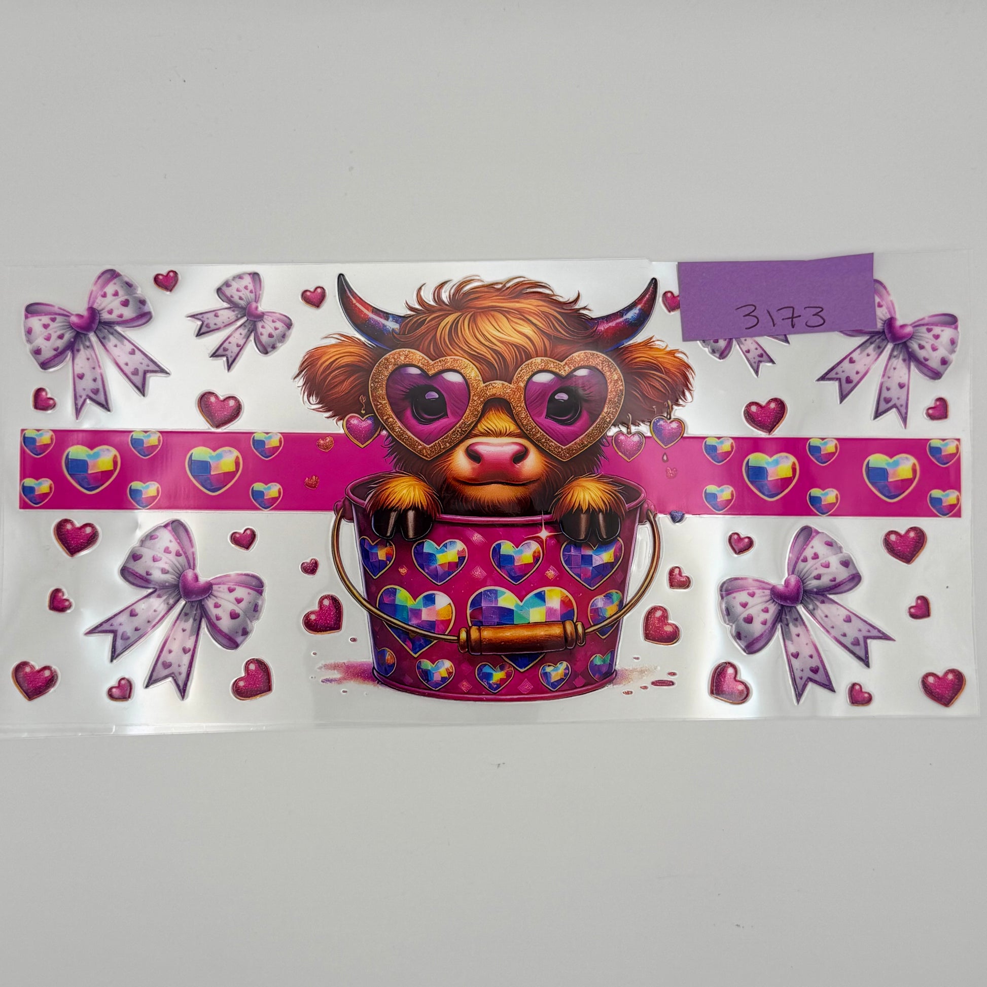 Highland Cow with heart glasses in bucket