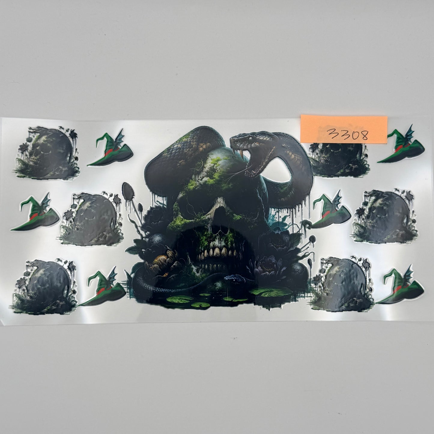 Green skull with snake