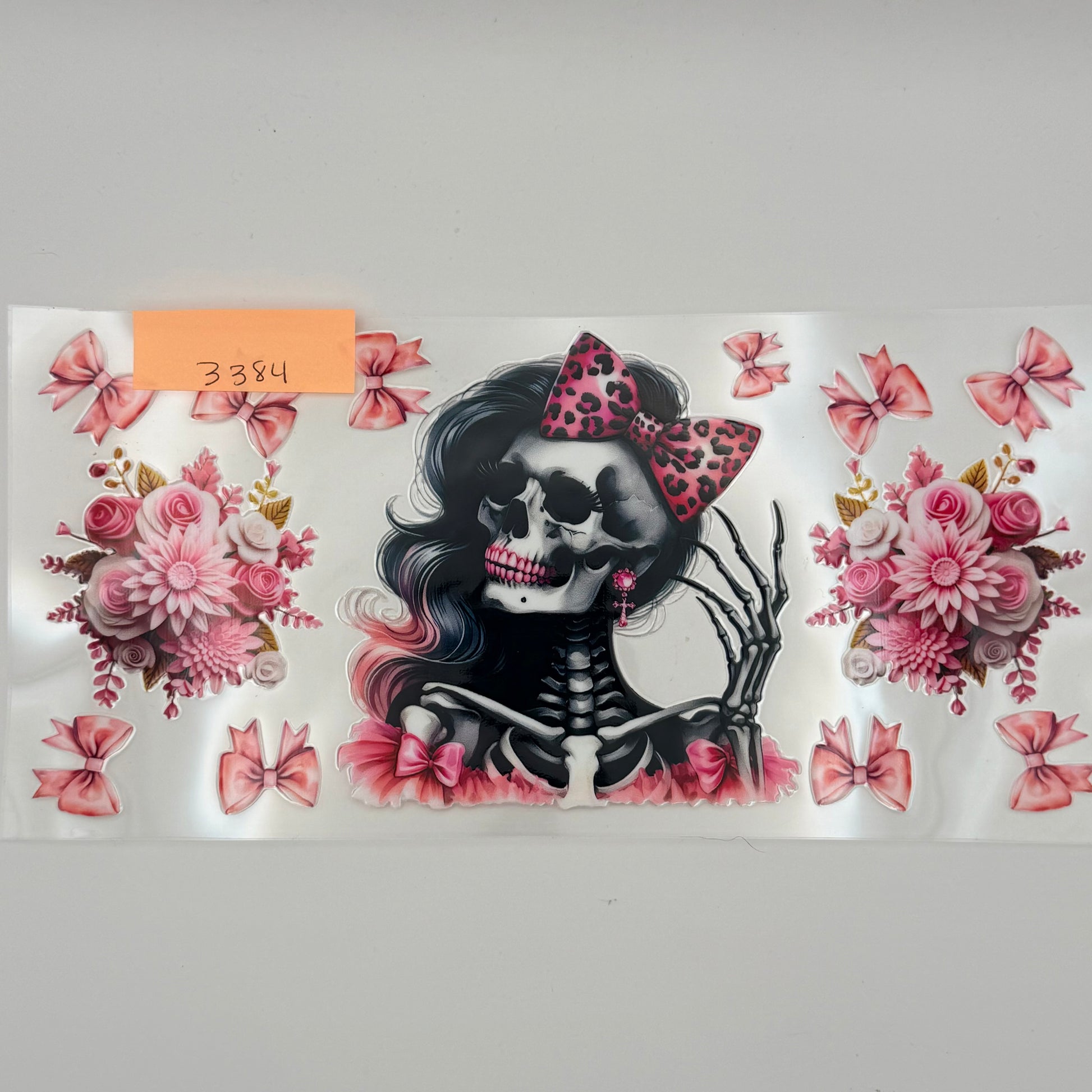 Pink skull with flowers and bows