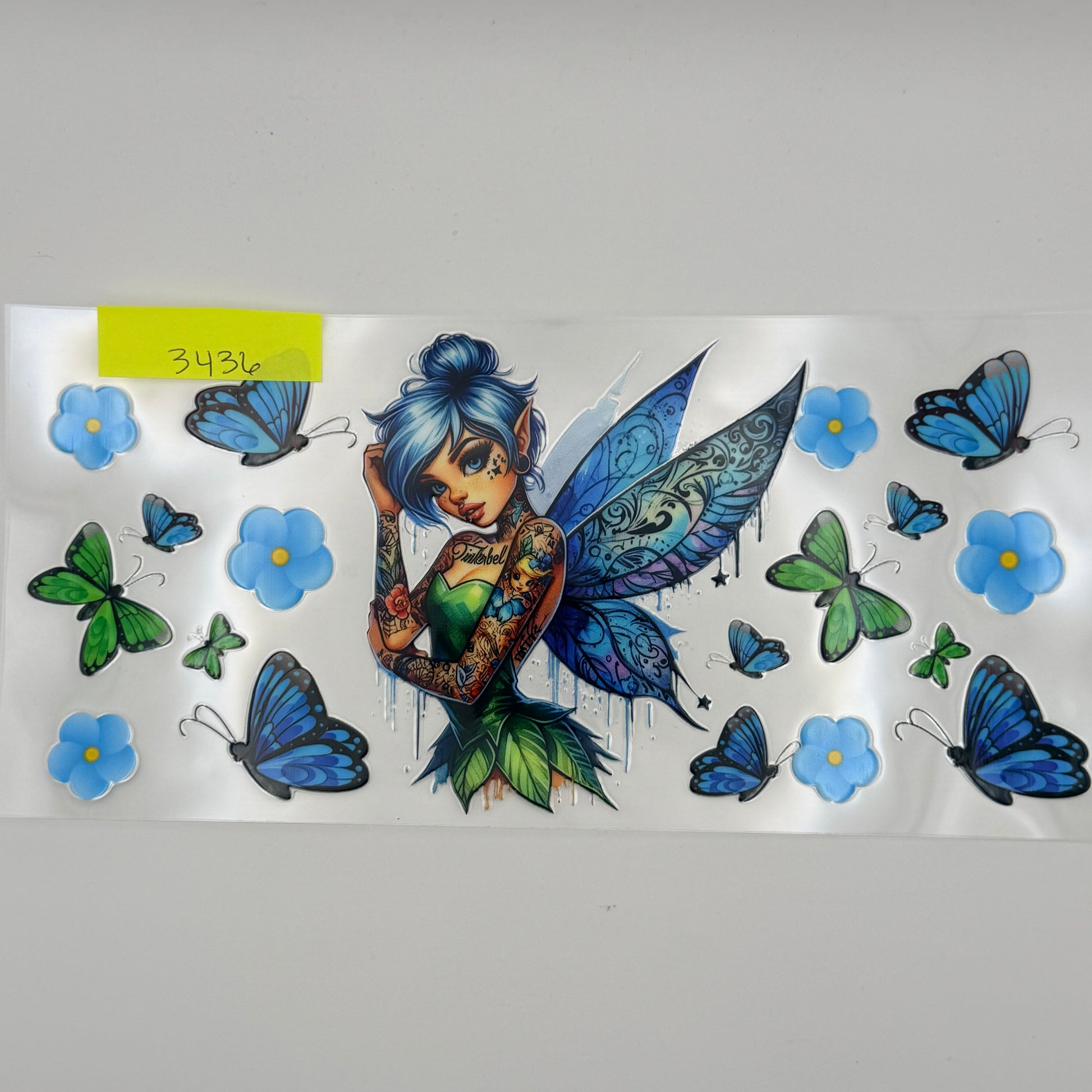 Blue tattooed fairie