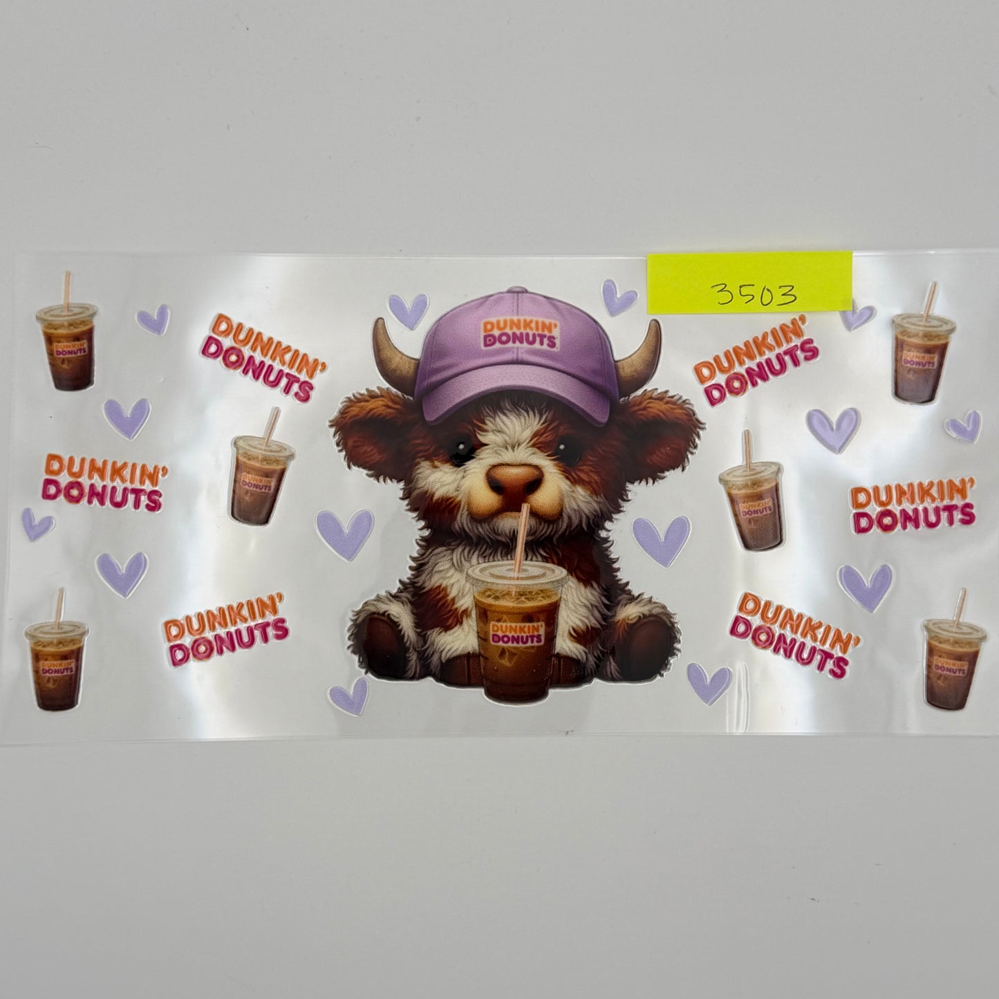 Dunkin highland cow with purple hat