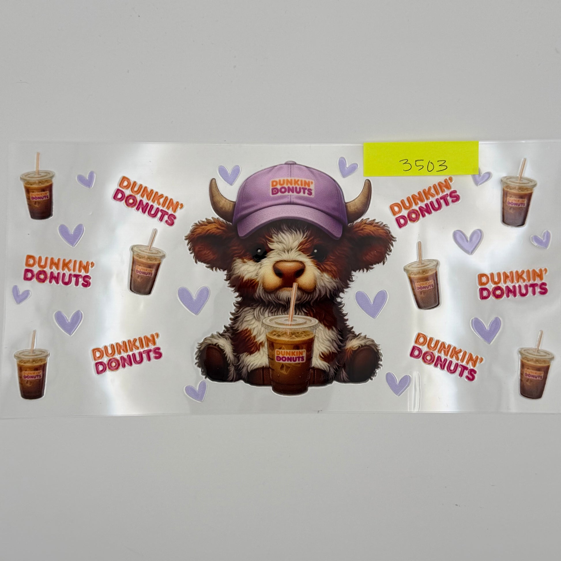 Dunkin highland cow with purple hat
